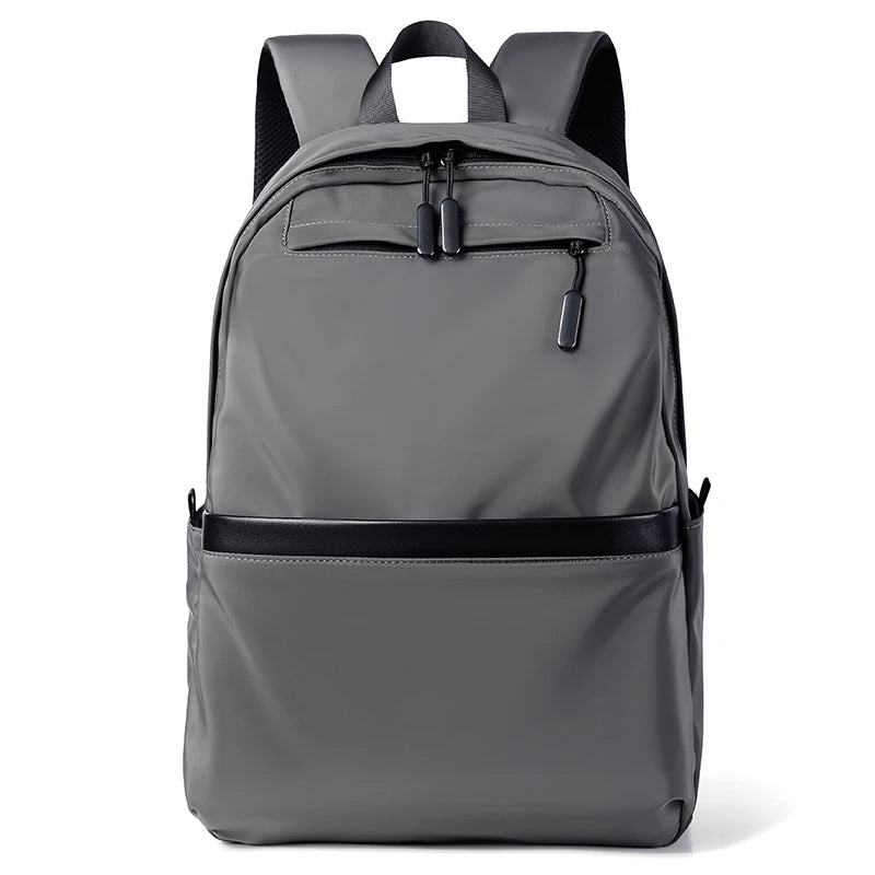 Men's black laptop backpack with a modern, minimalist design.