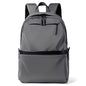 Men's black laptop backpack with a modern, minimalist design.