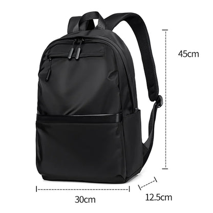 Men's black laptop backpack with a modern, minimalist design.