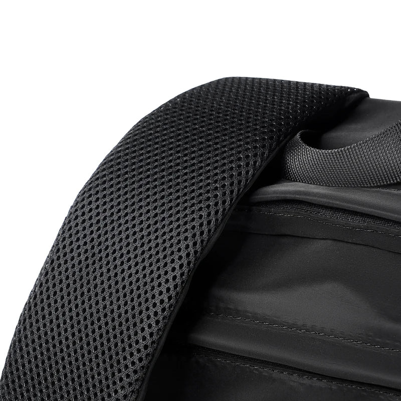 Men's black laptop backpack with a modern, minimalist design.