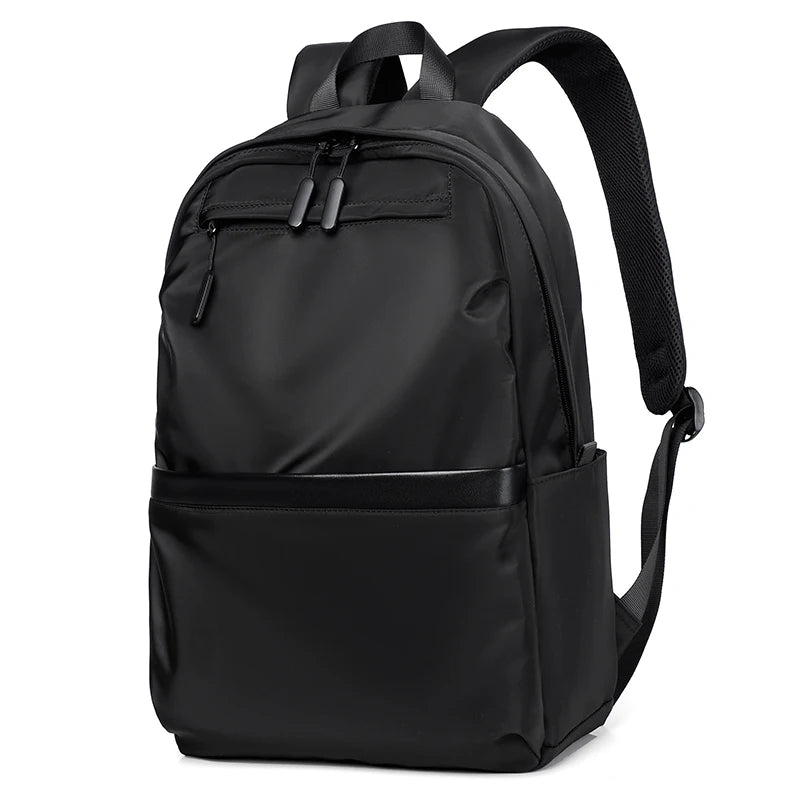 Men's black laptop backpack with a modern, minimalist design.