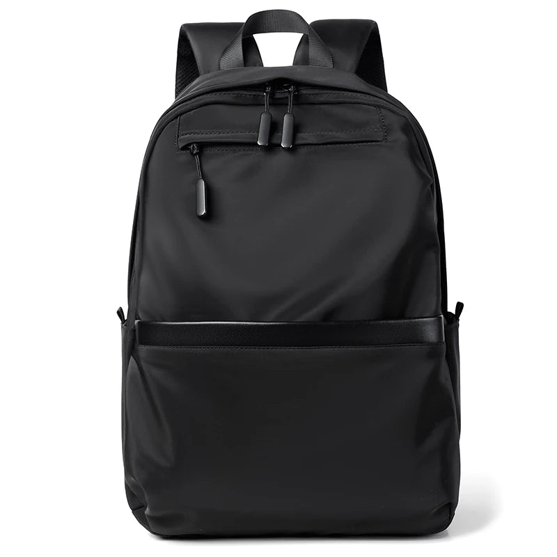 Men's black laptop backpack with a modern, minimalist design.